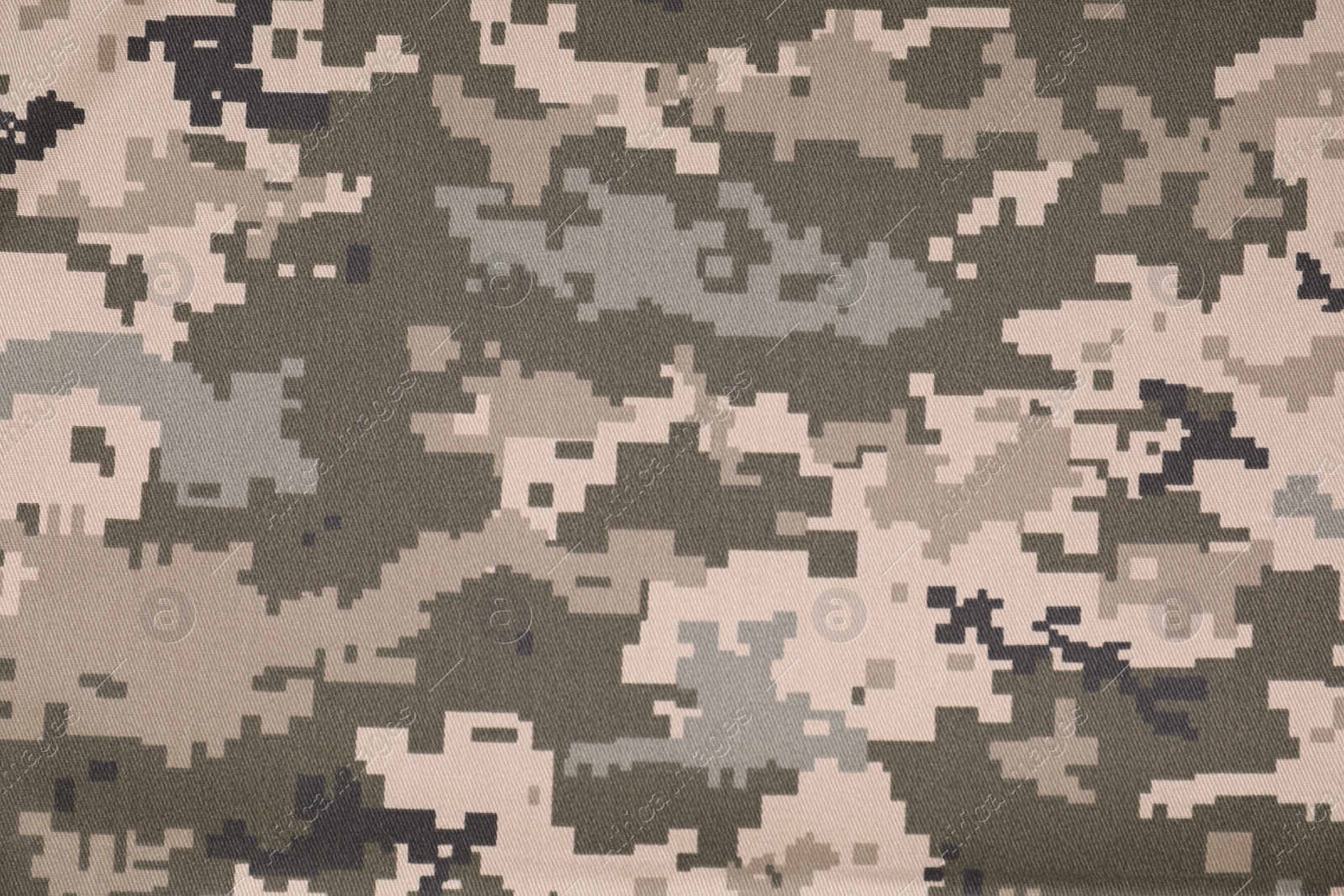 Photo of Texture of camouflage fabric as background, top view