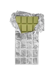 Photo of Tasty matcha chocolate bar wrapped in foil isolated on white, top view