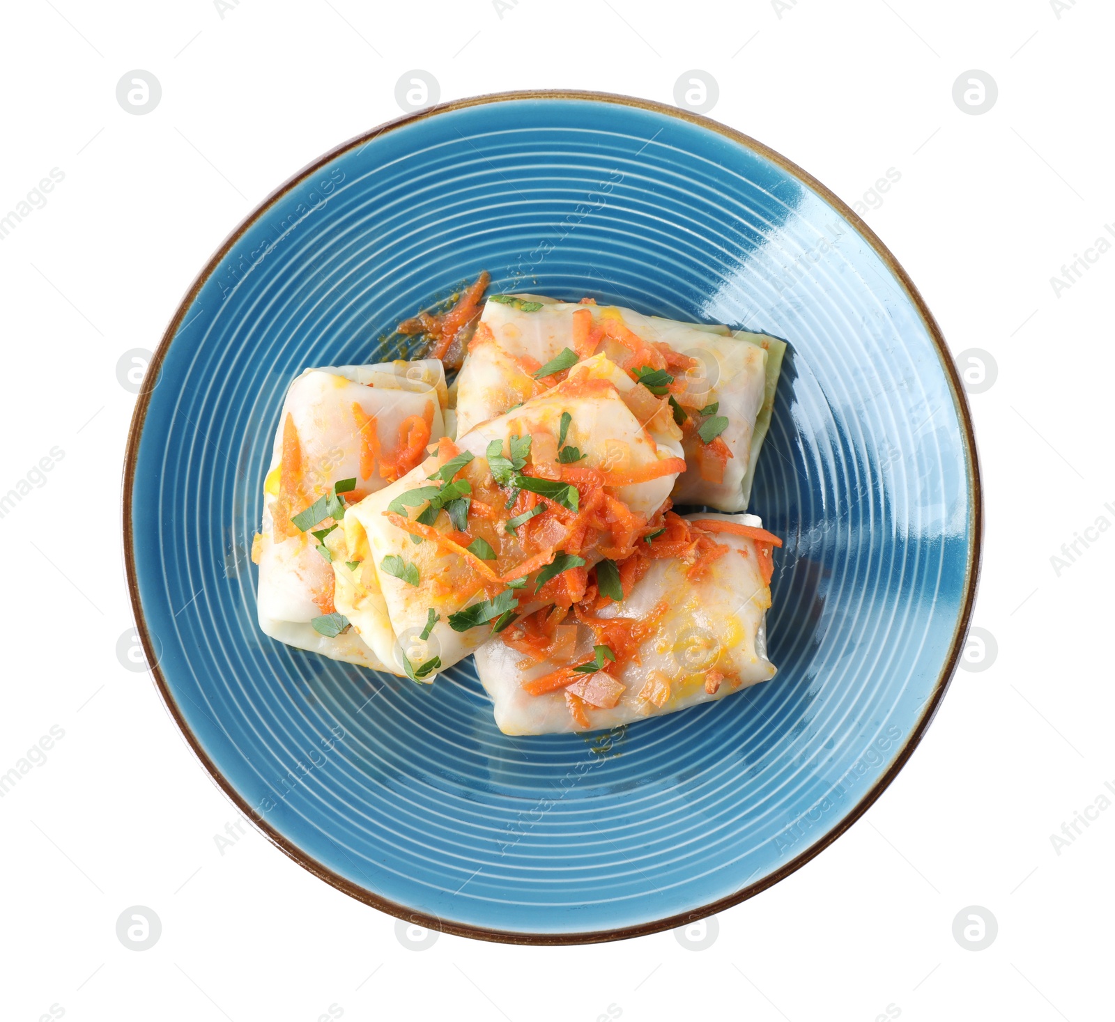 Photo of Delicious cabbage rolls with sauce isolated on white, top view