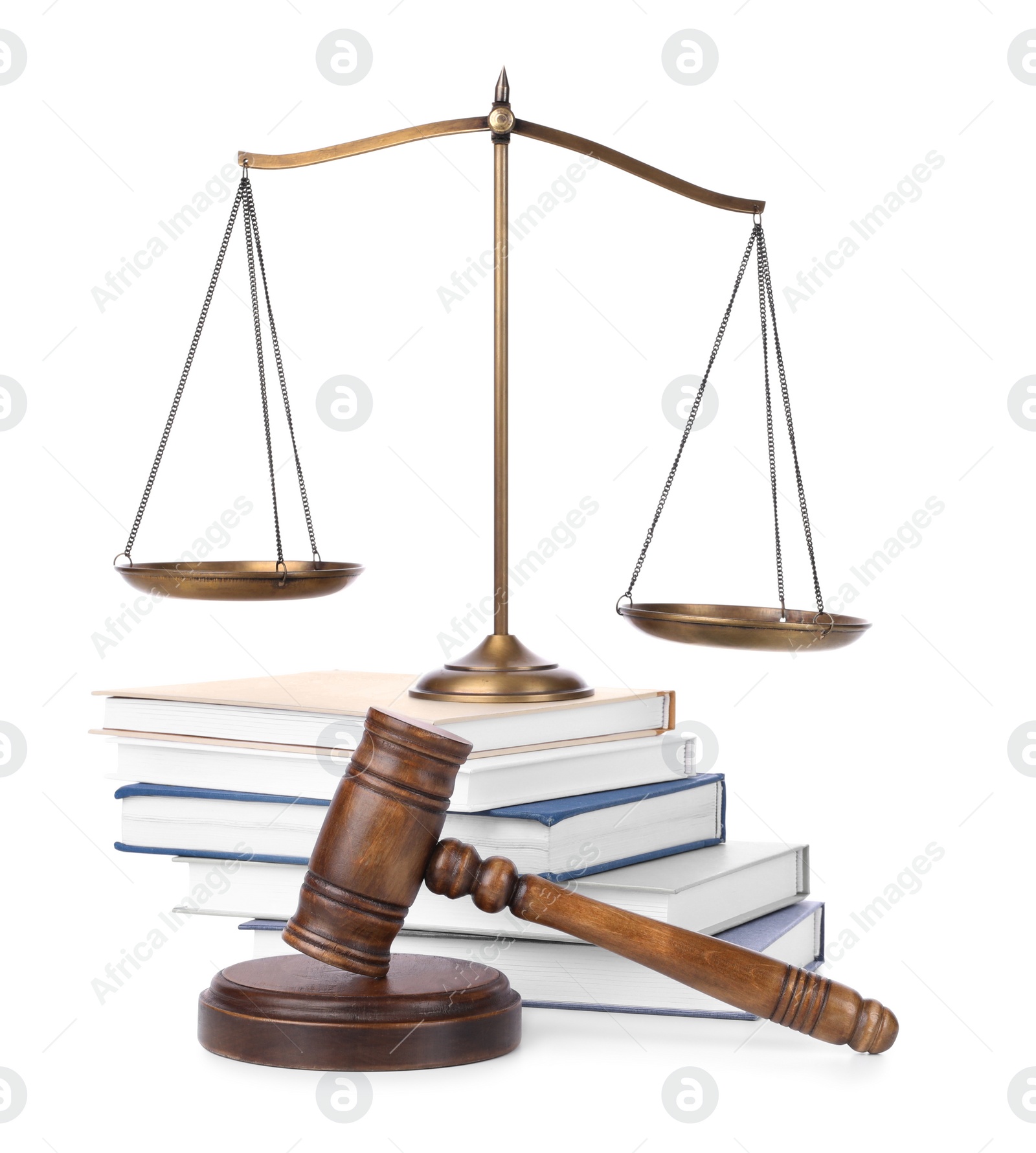 Photo of Wooden gavel, books and scales of justice on white background