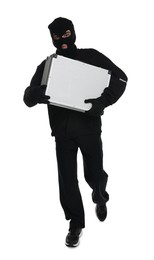 Photo of Thief in balaclava running with briefcase of money on white background