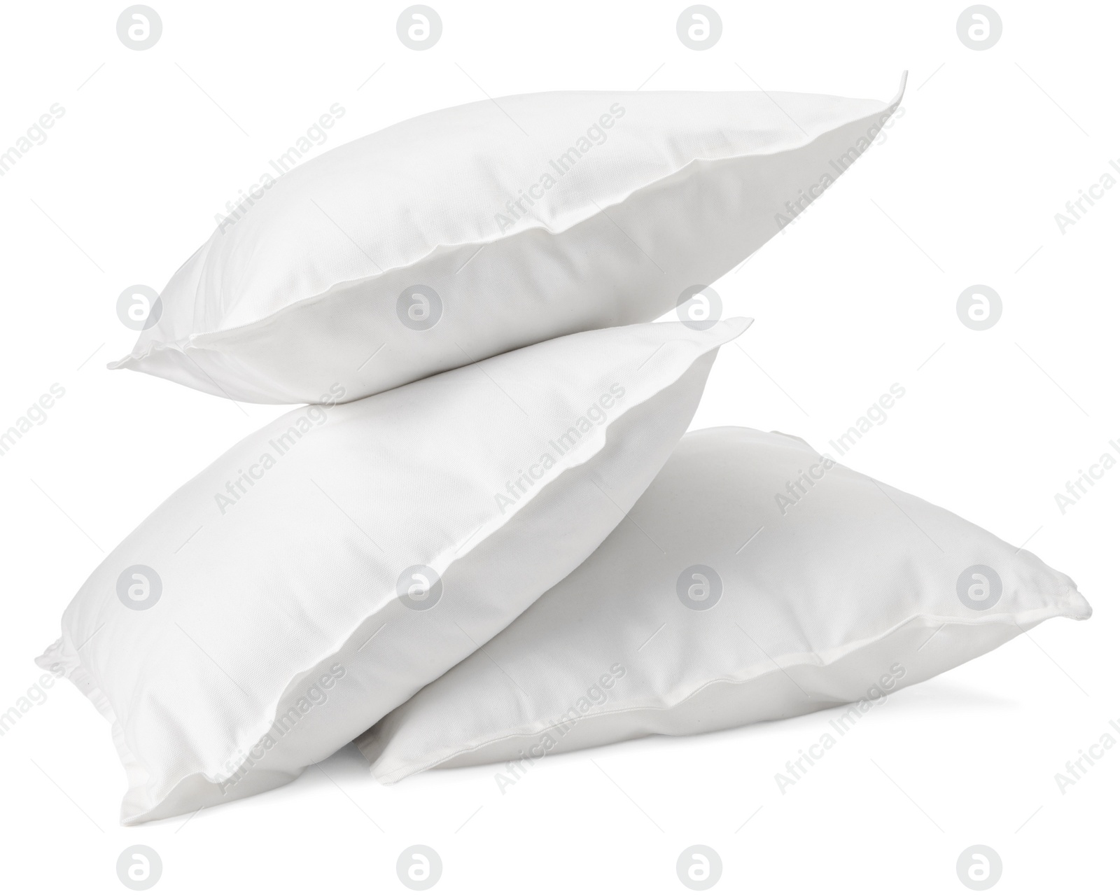 Photo of Three new soft pillows isolated on white