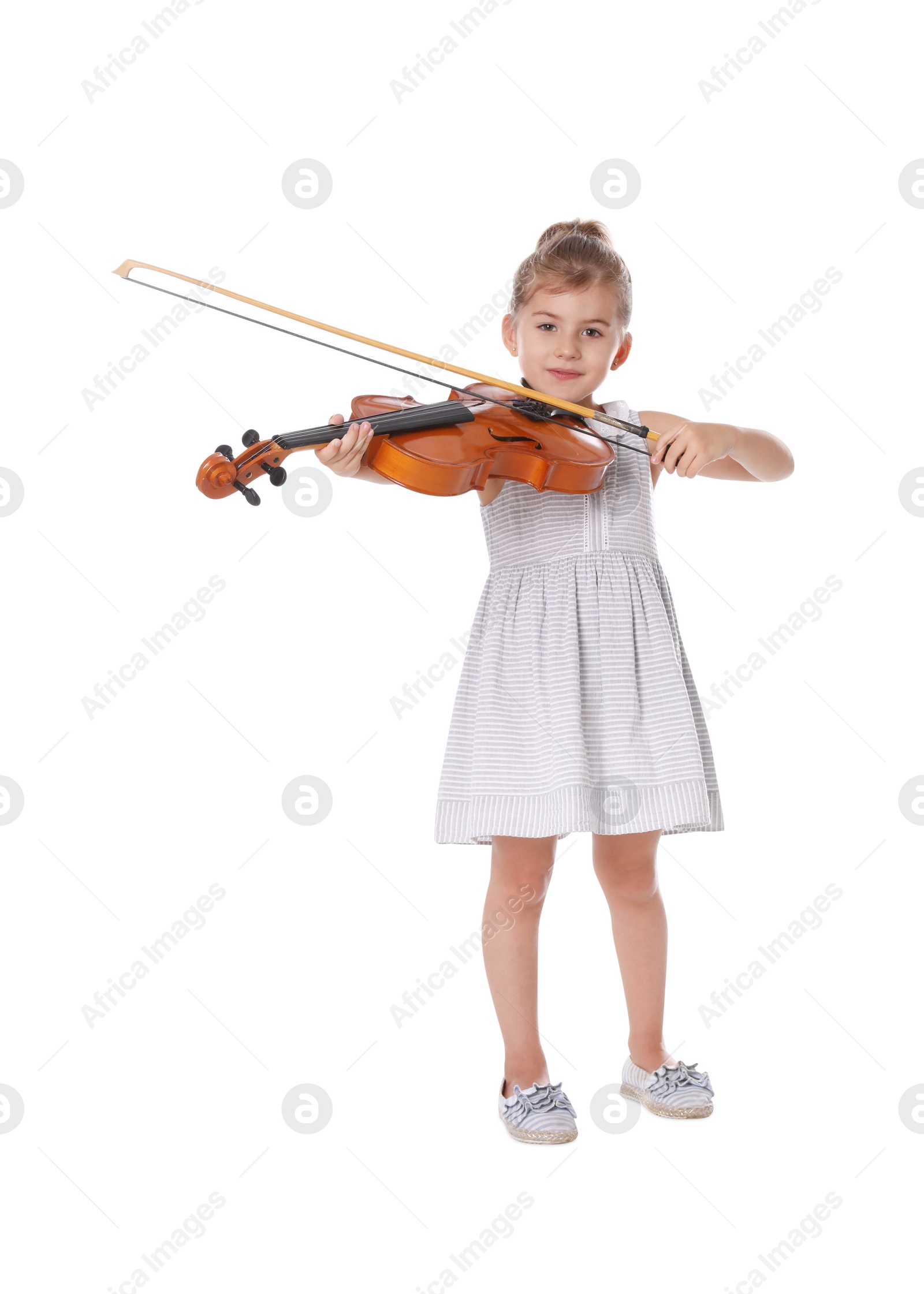 Photo of Little girl playing violin on white background