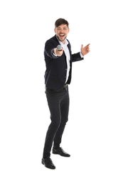 Photo of Handsome man in suit singing with microphone on white background