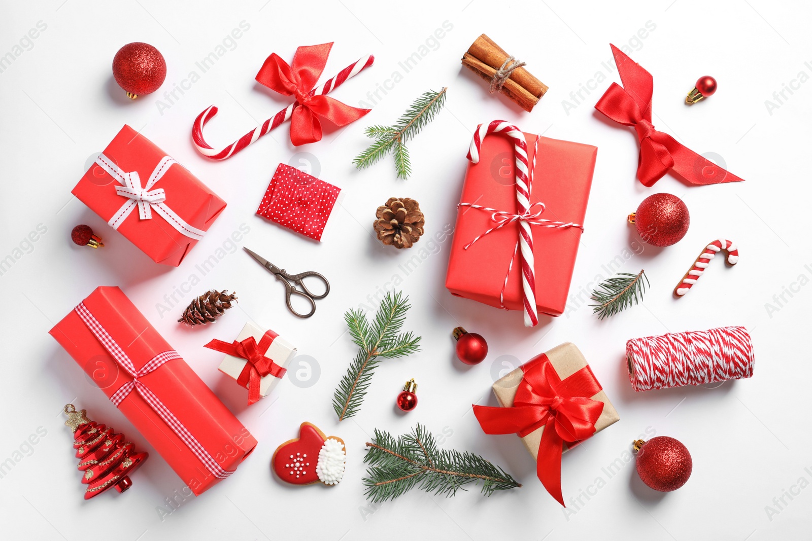 Photo of Flat lay composition with Christmas gifts on white background