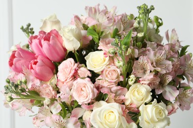 Beautiful bouquet of fresh flowers on white background, closeup