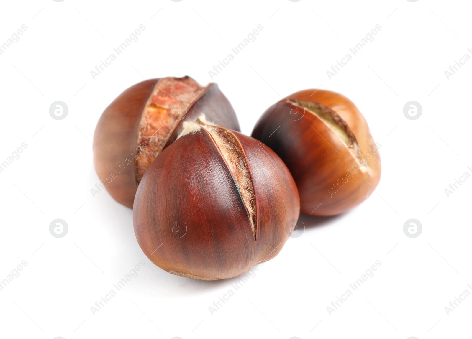 Photo of Delicious sweet roasted edible chestnuts isolated on white