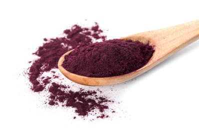 Photo of Wooden spoon with acai powder on white background