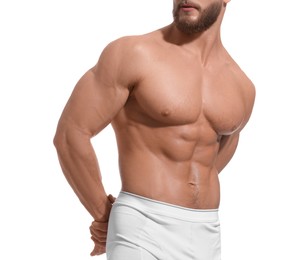 Photo of Muscular man showing abs isolated on white, closeup. Sexy body
