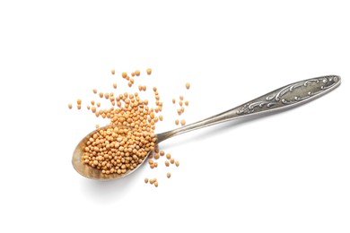 Spoon with mustard seeds on white background, top view