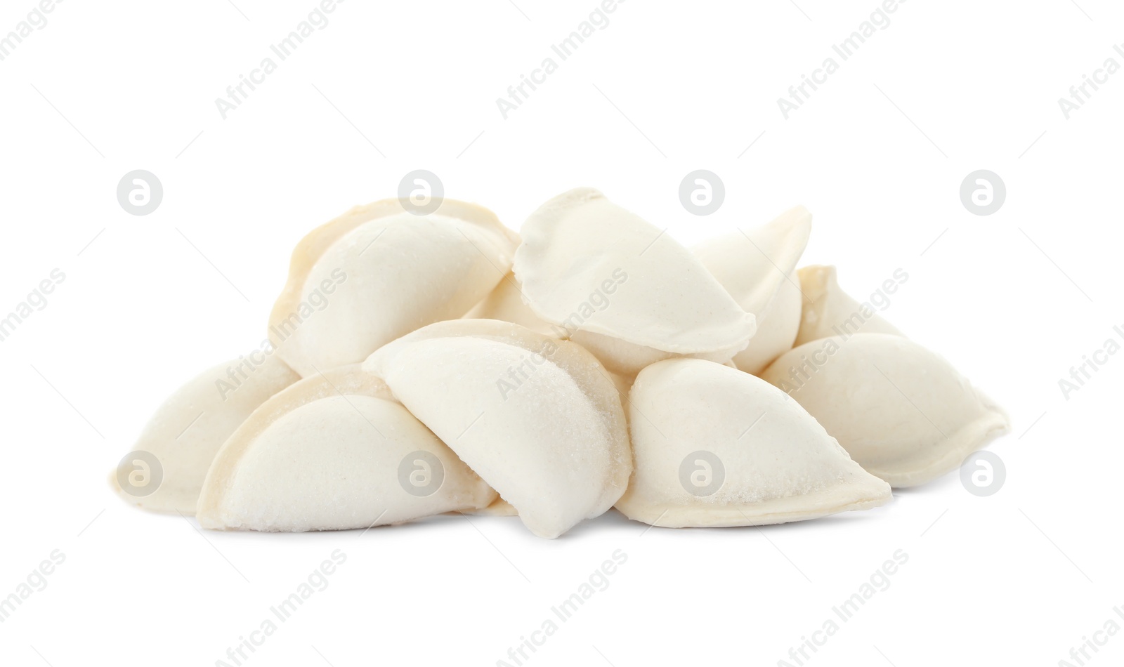 Photo of Heap of raw dumplings on white background