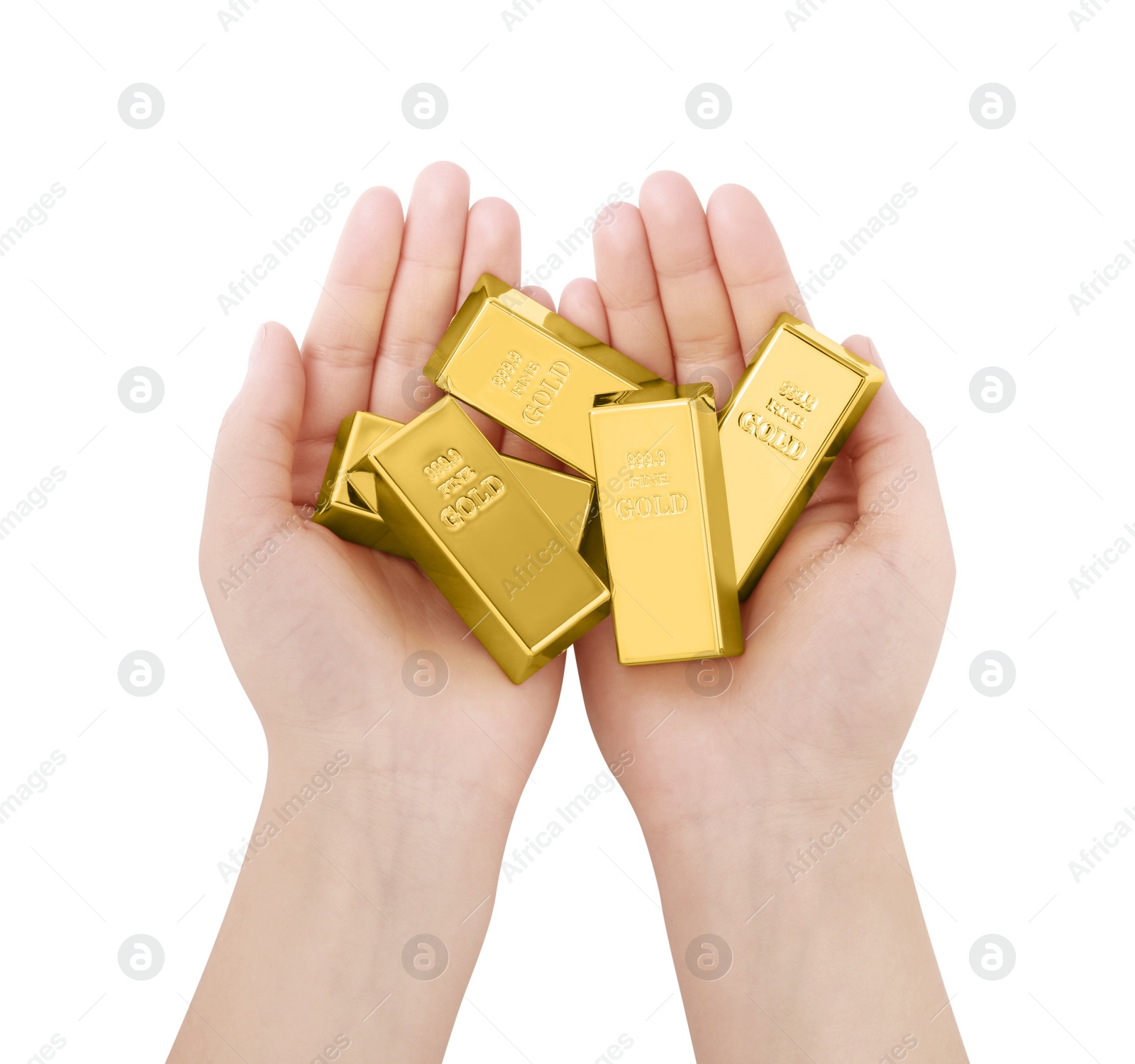 Photo of Woman holding shiny gold bars on white background, top view