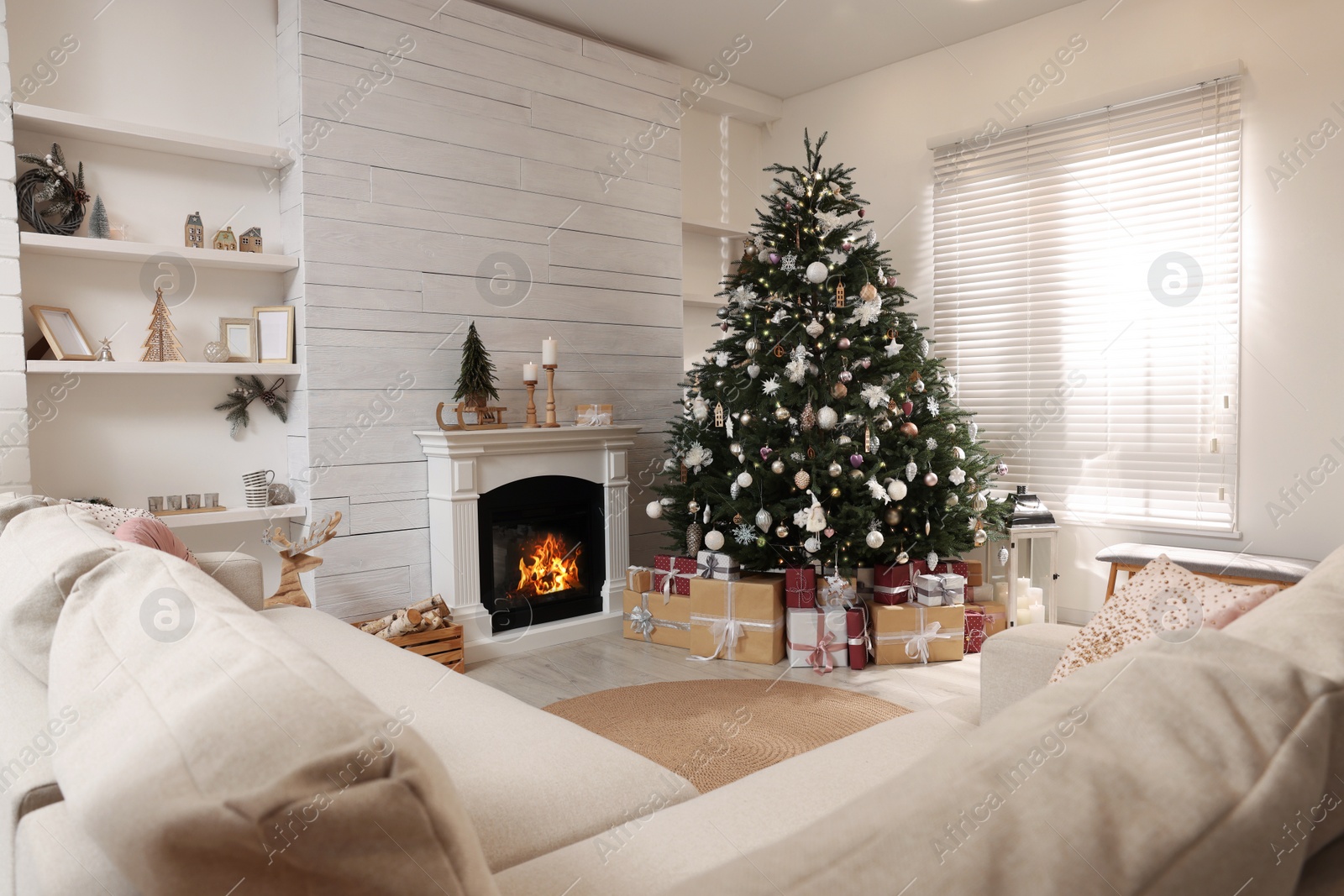 Photo of Festive living room interior with beautiful Christmas tree