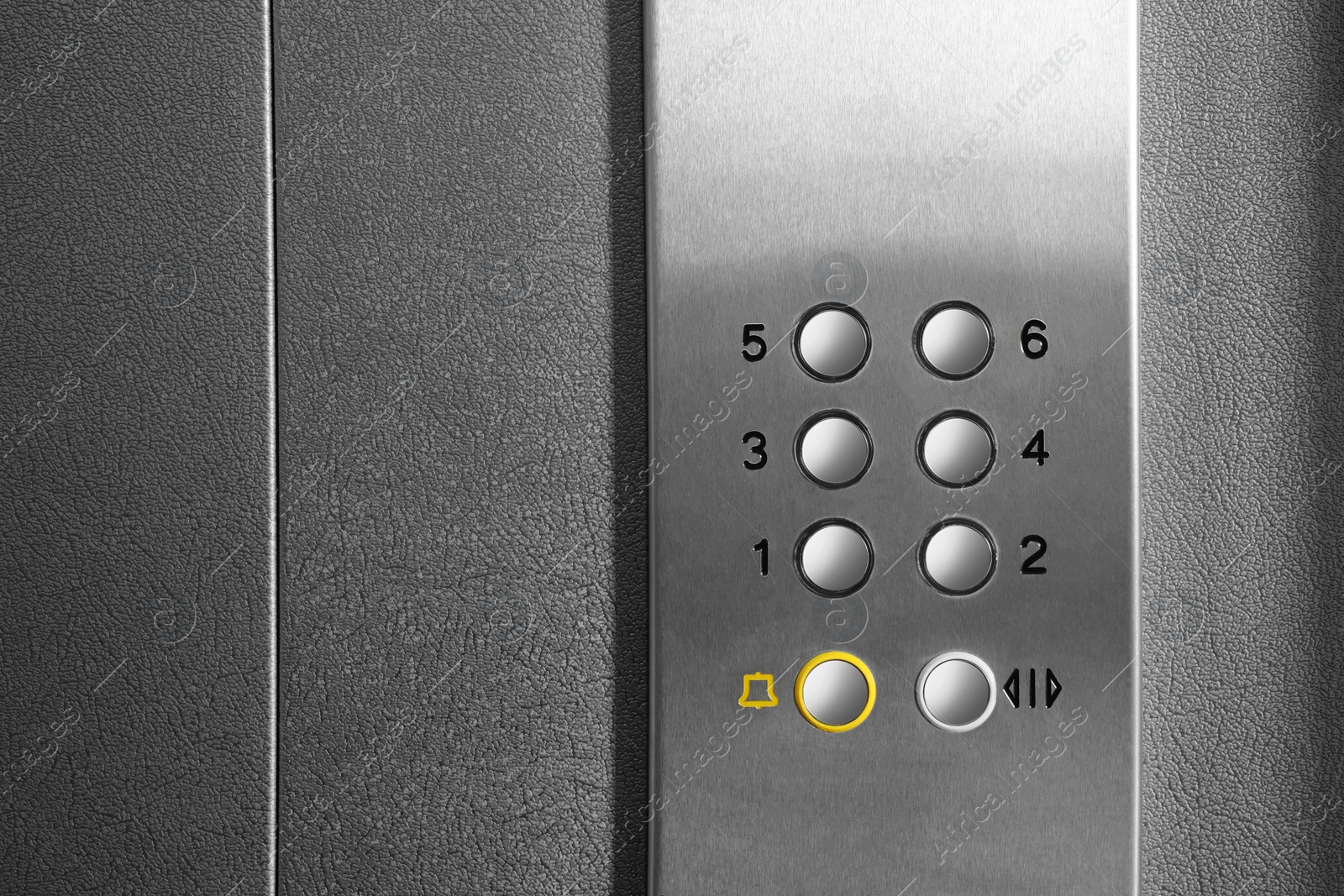 Photo of Clean stylish elevator call panel with buttons, closeup