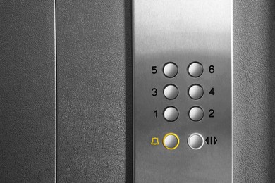 Clean stylish elevator call panel with buttons, closeup