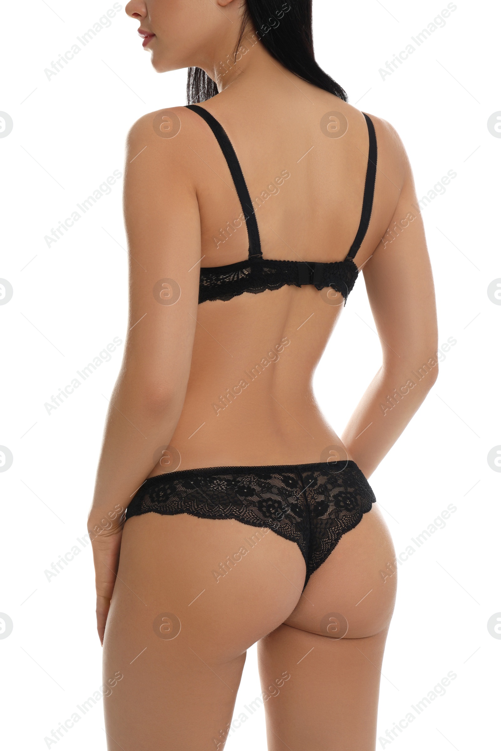 Photo of Young woman in black underwear isolated on white, closeup