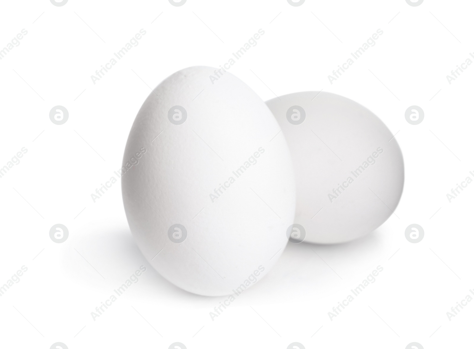 Photo of Fresh raw chicken eggs isolated on white