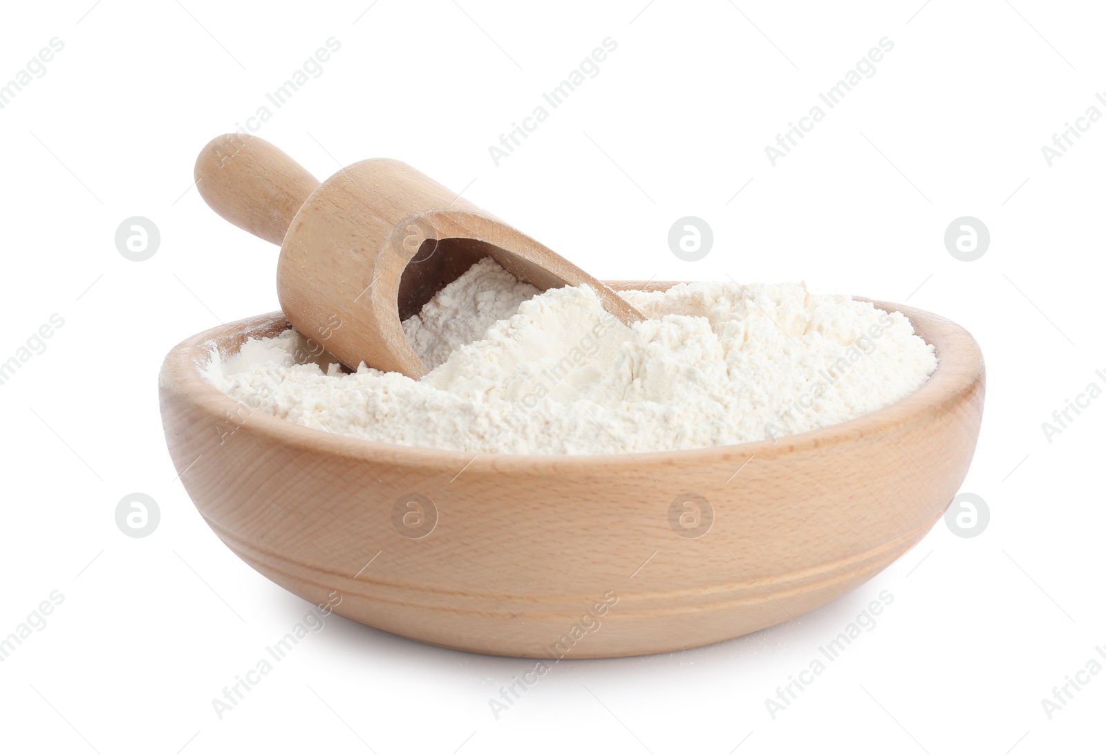 Photo of Organic flour and scoop in wooden bowl isolated on white