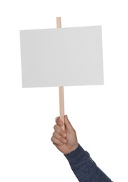 Photo of Man holding blank protest sign on white background, closeup