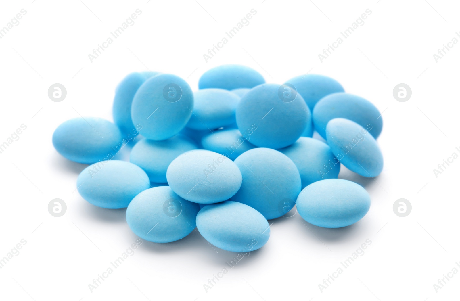 Photo of Blue pills on white background