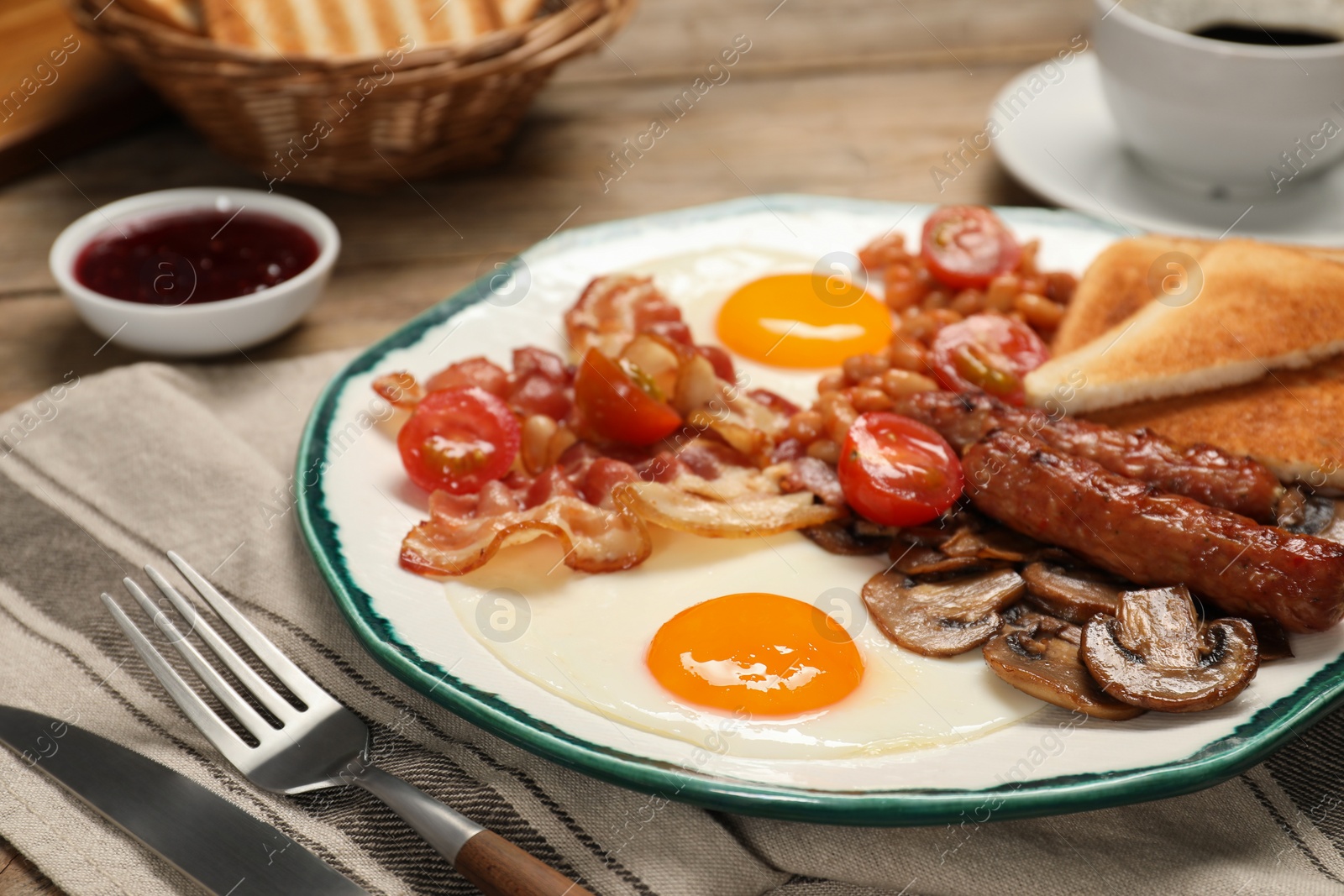 Photo of Traditional English breakfast served on table, closeup