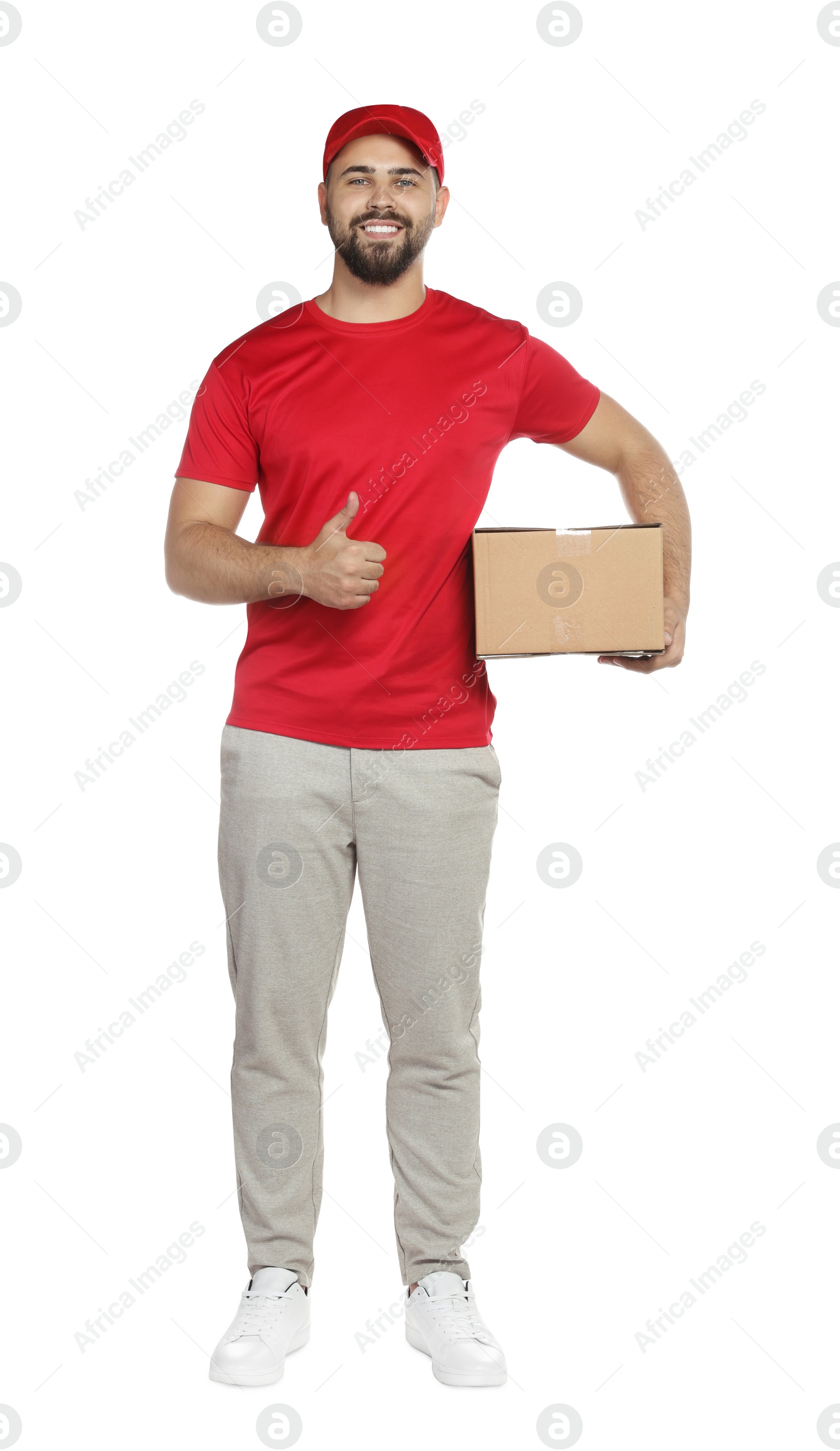 Photo of Courier holding cardboard box on white background