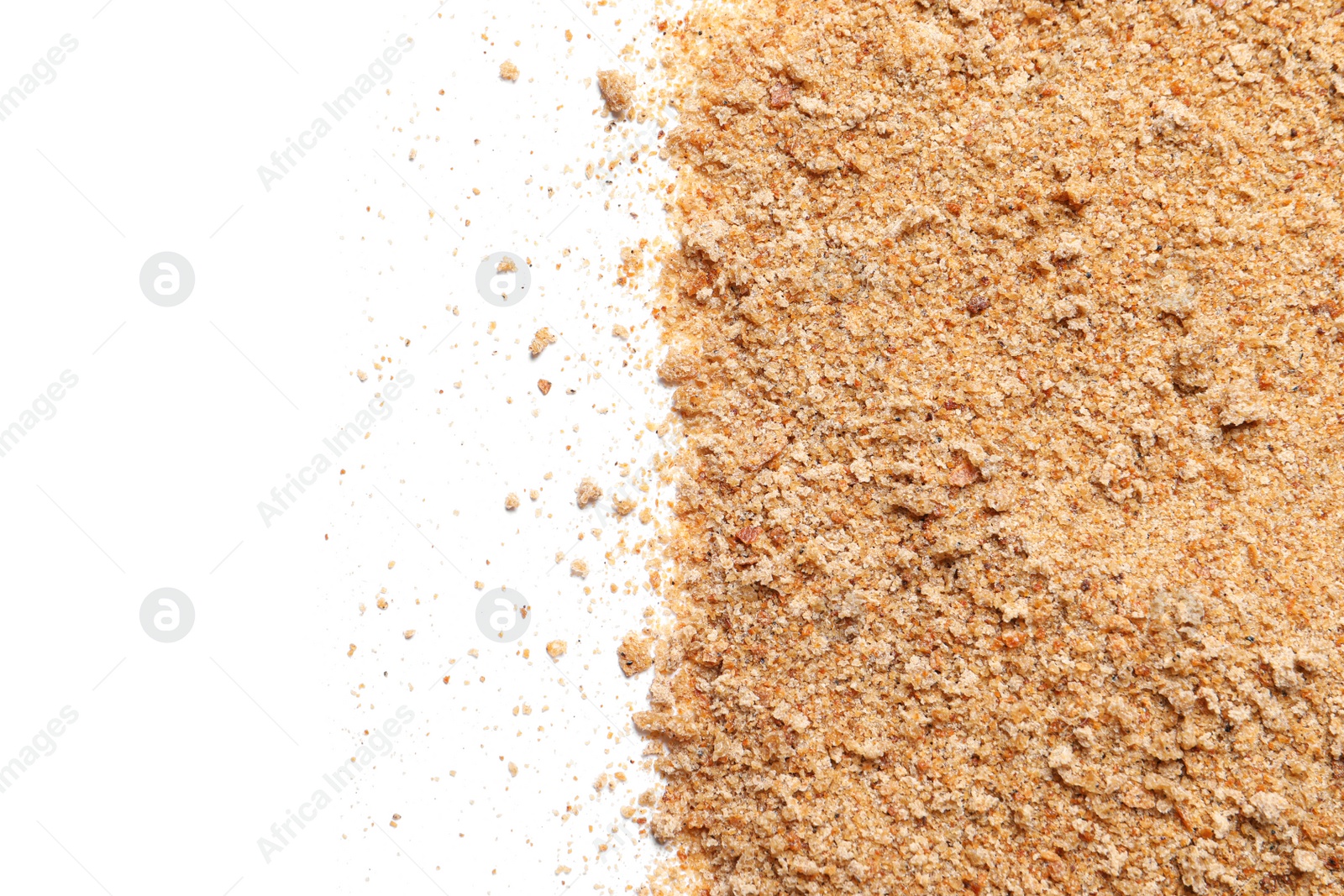 Photo of Pile of fresh bread crumbs on white background, top view