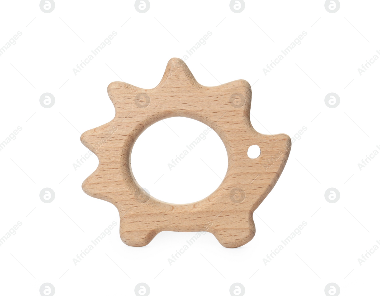 Photo of One wooden toy hedgehog for children isolated on white