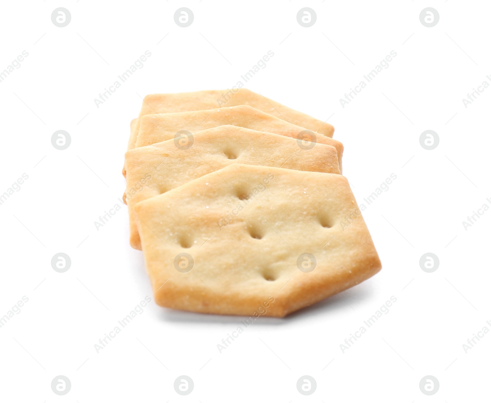 Photo of Crispy crackers isolated on white. Delicious snack