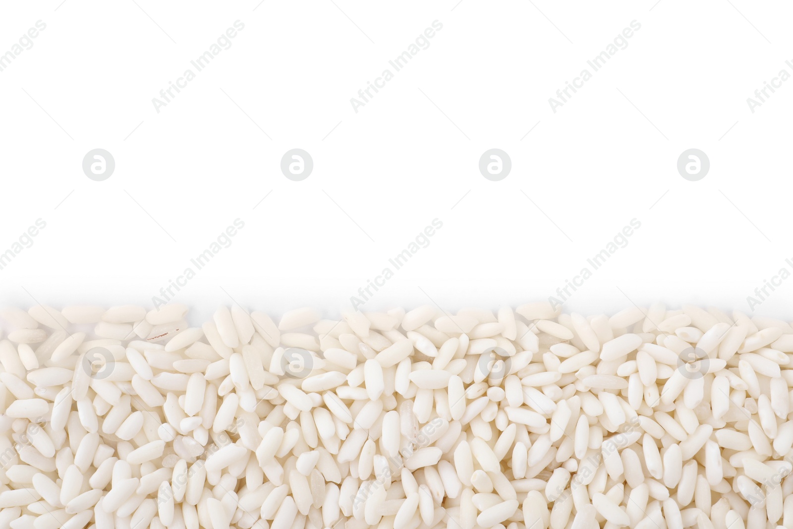 Photo of Raw polished rice isolated on white, top view