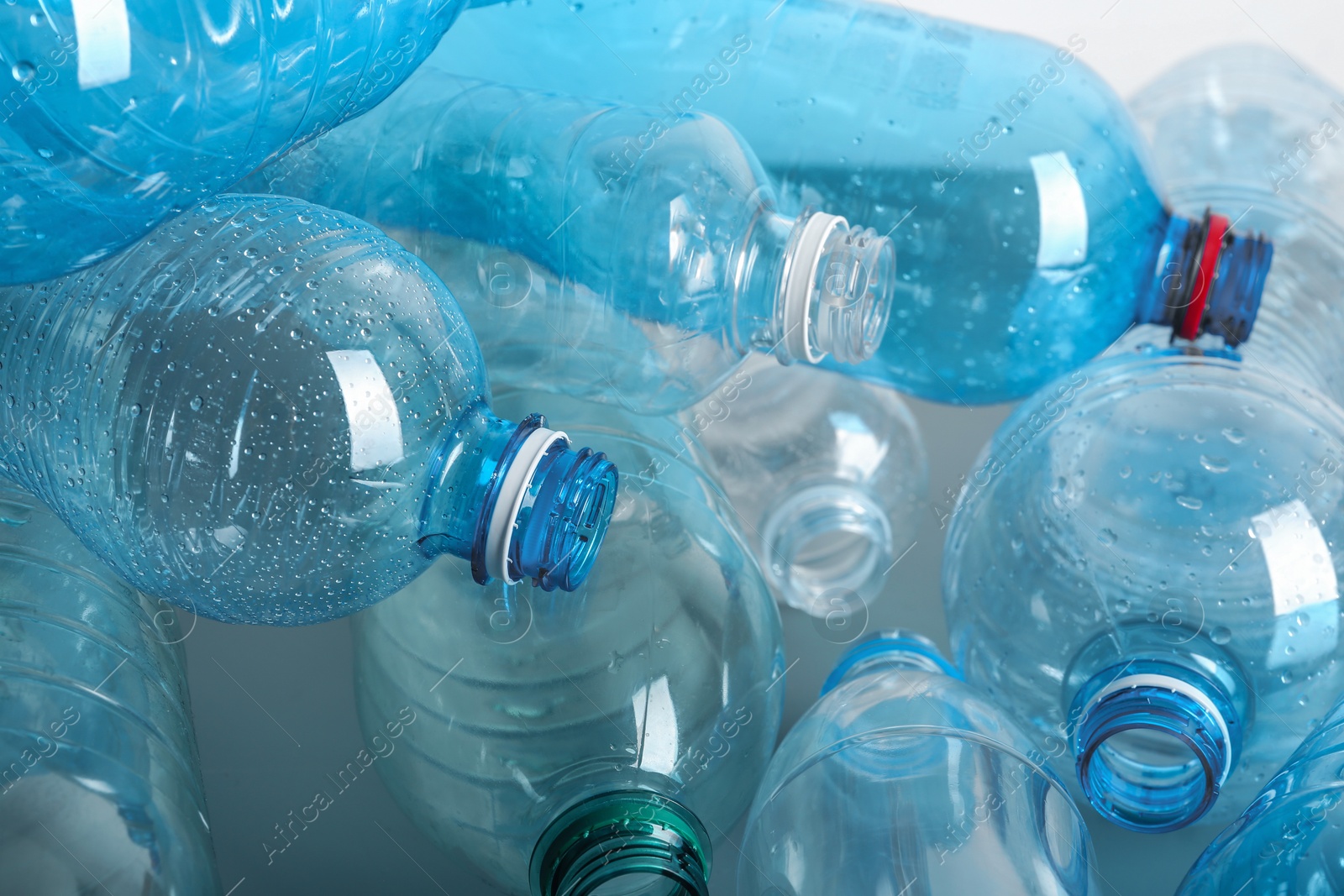 Photo of Many plastic bottles as background, closeup. Recycle concept