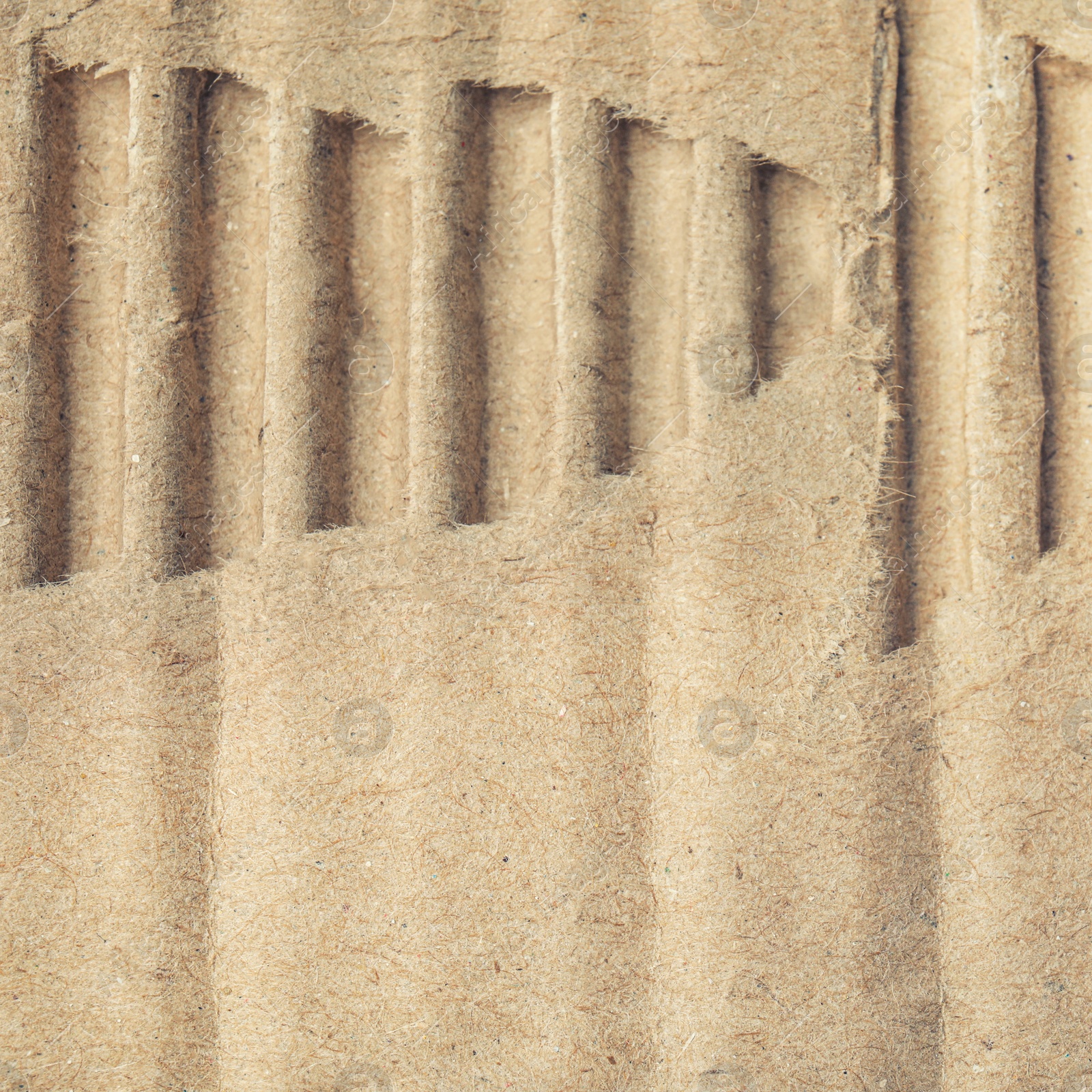 Image of Wall paper design. Brown corrugated sheet of cardboard as background