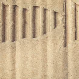 Image of Wall paper design. Brown corrugated sheet of cardboard as background