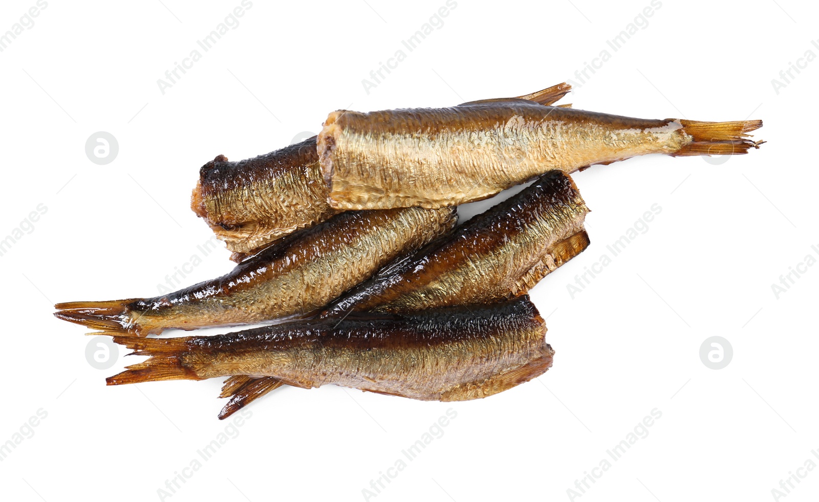 Photo of Many tasty smoked sprats isolated on white, top view