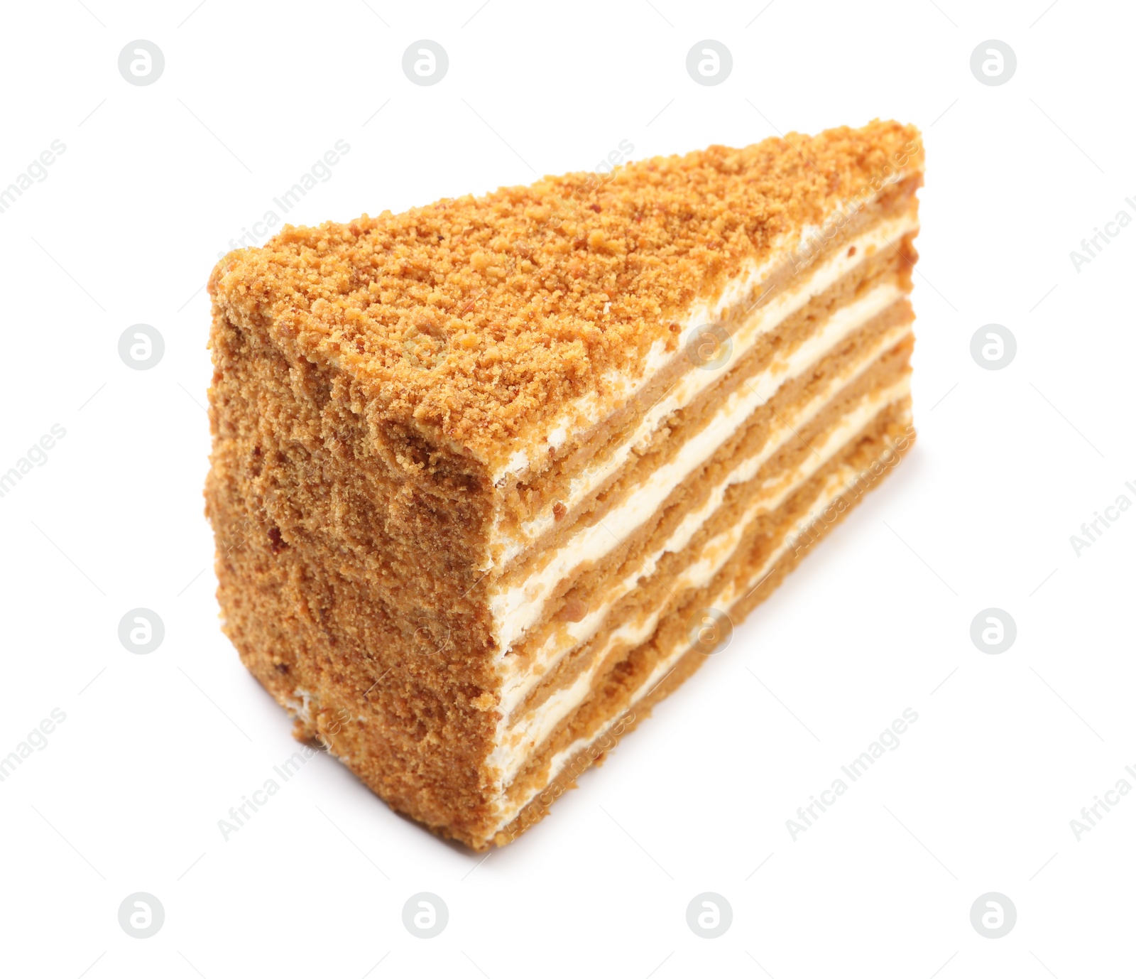 Photo of Slice of delicious honey cake isolated on white