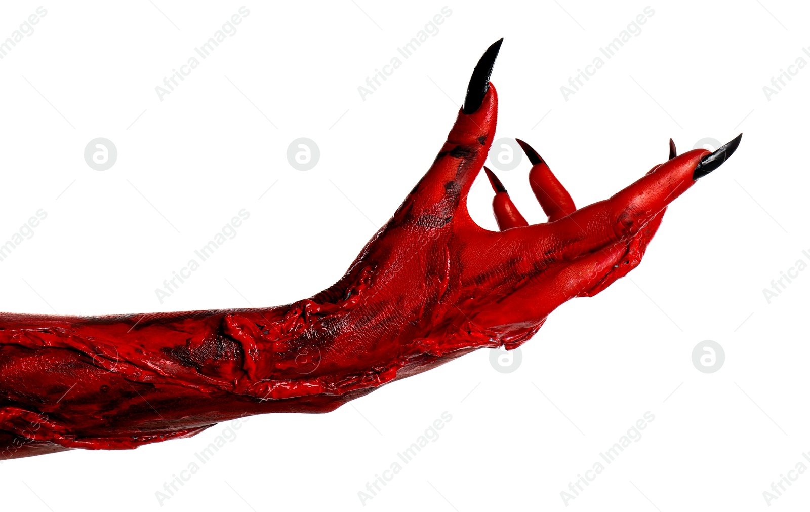 Photo of Scary monster on white background, closeup of hand. Halloween character