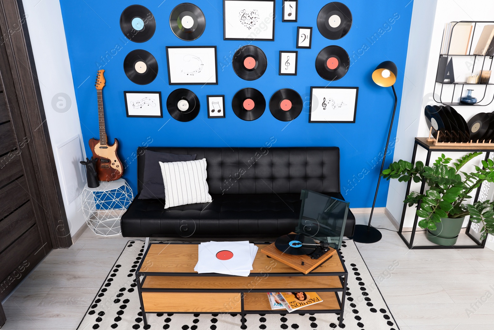 Photo of Living room decorated with vinyl records. Interior design