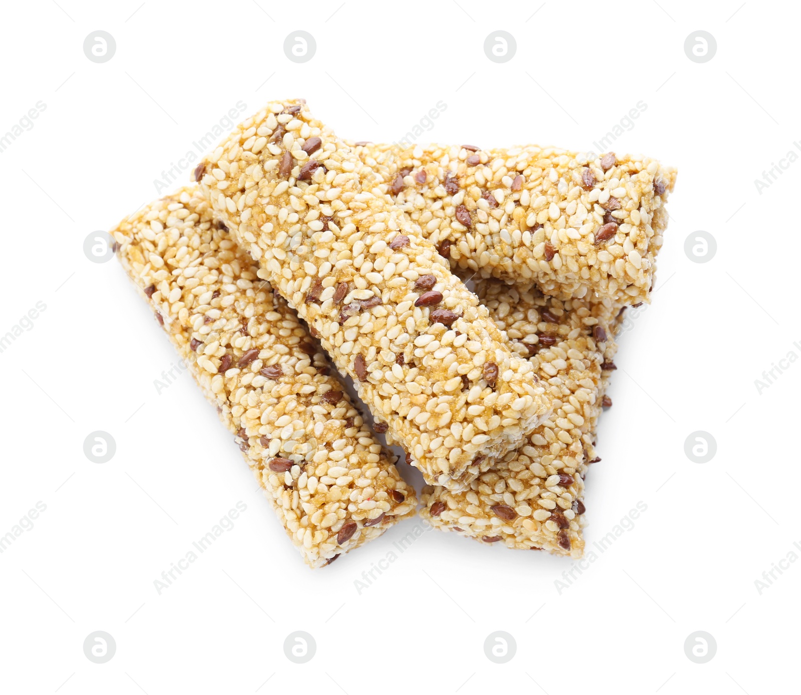 Photo of Tasty sesame seed bars isolated on white