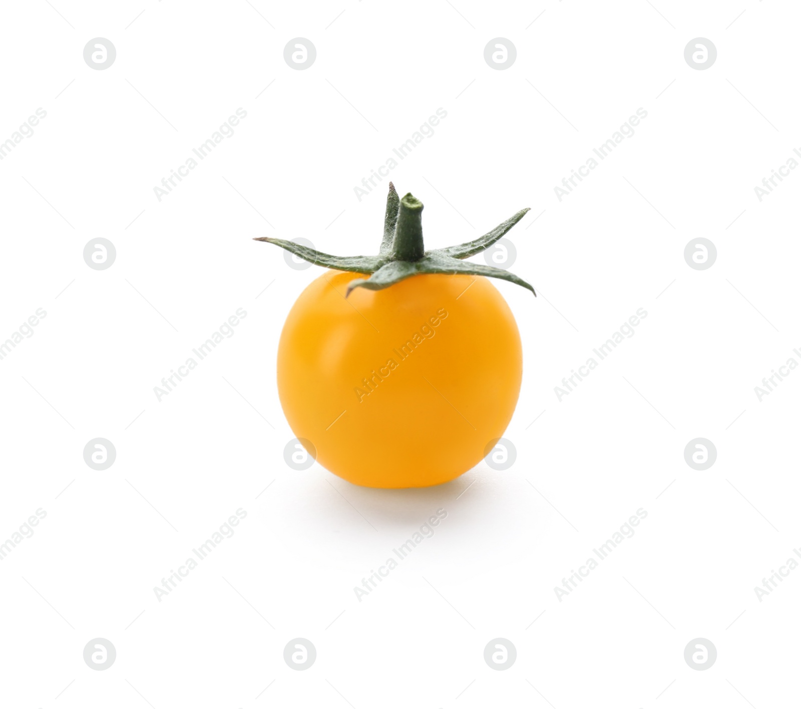 Photo of Ripe yellow cherry tomato isolated on white