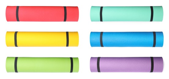 Image of Set with colorful rolled camping mats on white background. Banner design