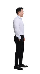 Businessman in formal clothes posing on white background