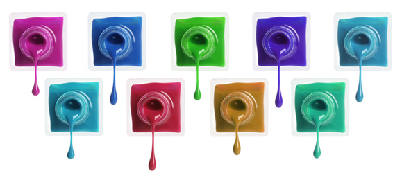 Image of Setdifferent nail polishes dripping on white background. Banner design