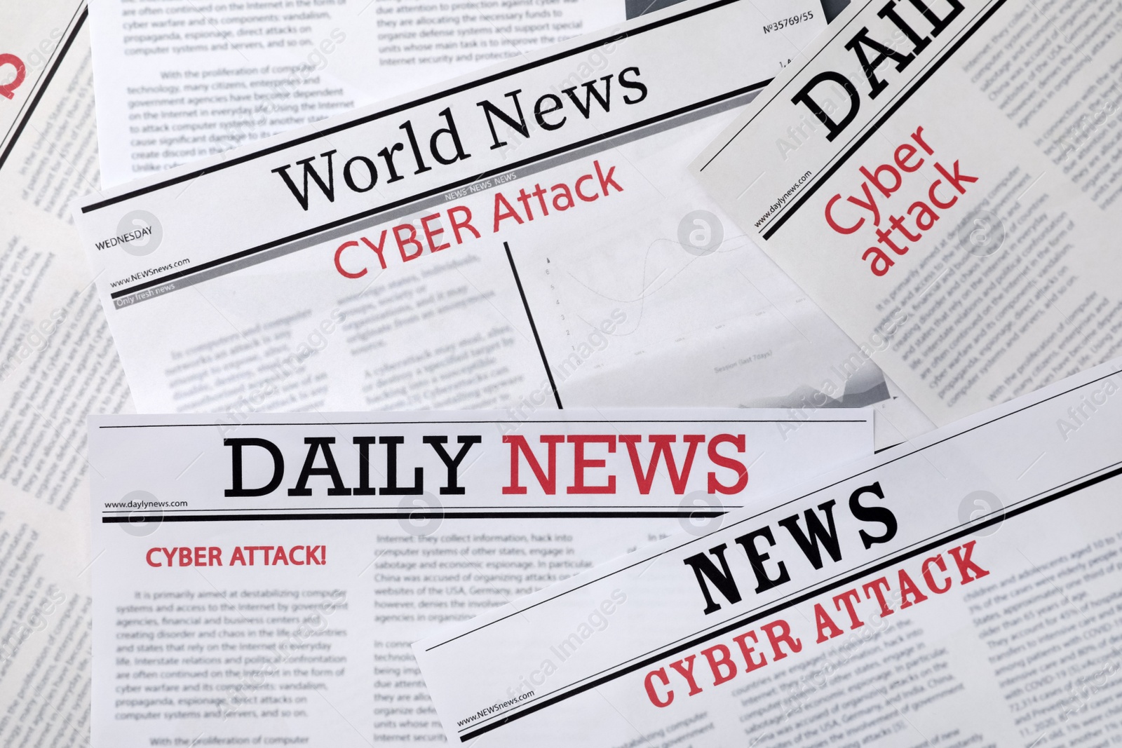 Photo of Newspapers with headlines Cyber Attack as background, closeup