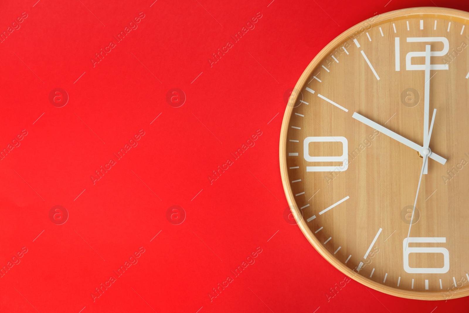 Photo of Big clock on color background. Time change concept