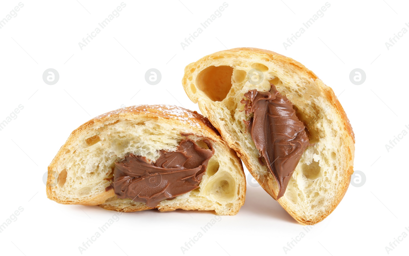 Photo of Halves of tasty croissant with chocolate and sugar powder on white background