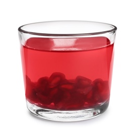 Tasty jelly dessert with pomegranate seeds in glass on white background