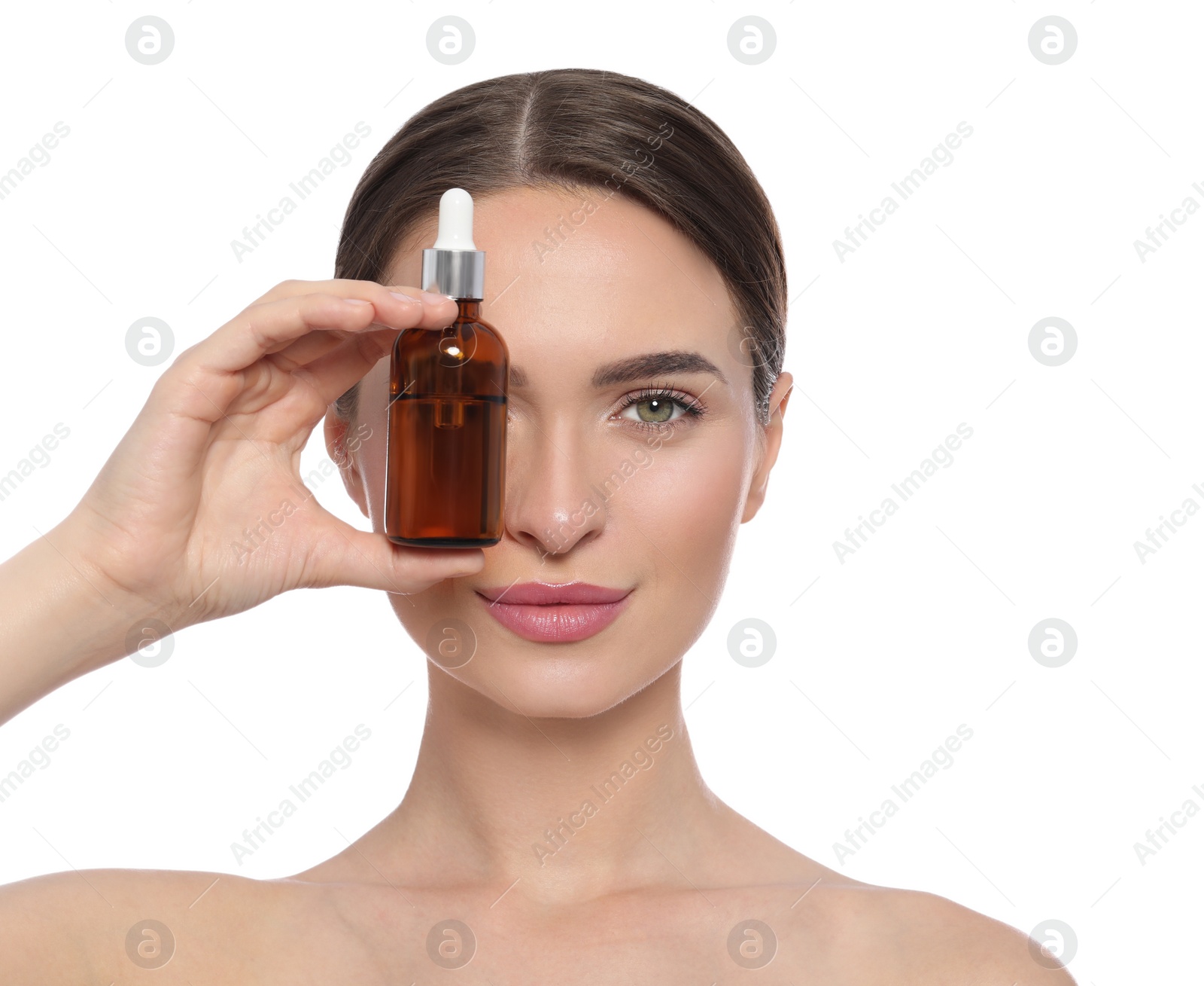 Photo of Young woman with bottle of essential oil on white background