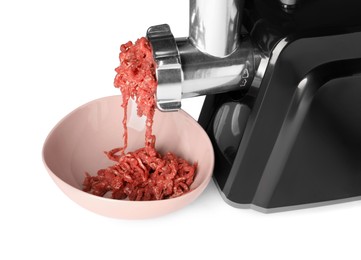 Photo of Electric meat grinder with beef mince isolated on white