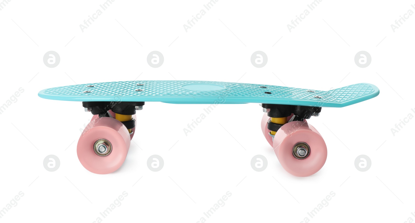 Photo of Turquoise skateboard with pink wheels isolated on white. Sport equipment