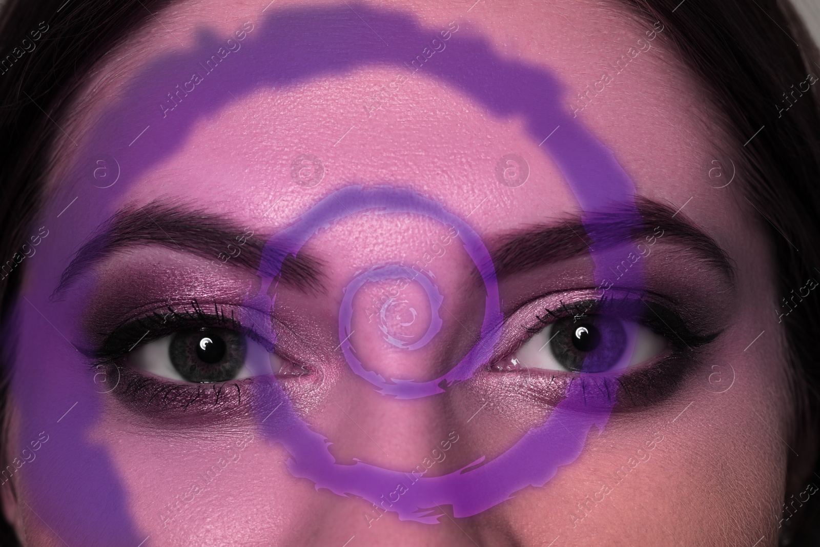 Image of Hypnosis and therapy. Swirl over young woman's face, closeup. Collage design